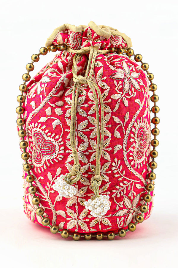 FUSCHIA PINK AND GOLD POTLI WITH CHIKANKARI AND ZARDOZI